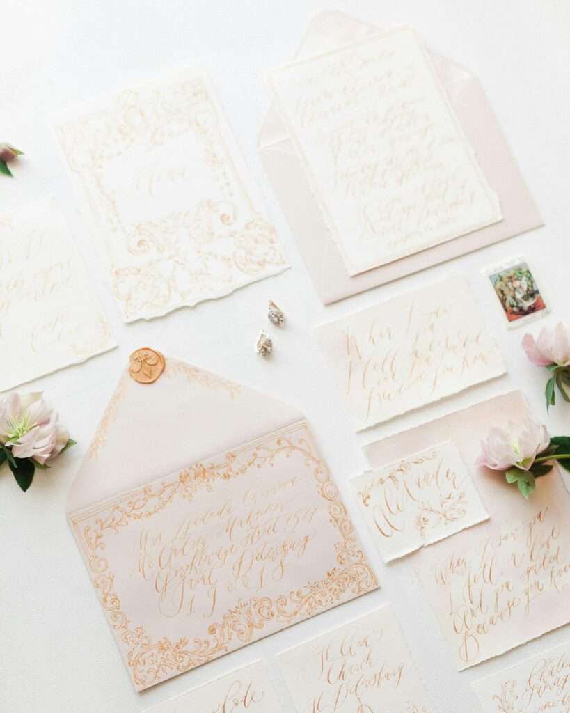 Handmade Envelopes and Greeting Cards Flat Laid Against a White Background